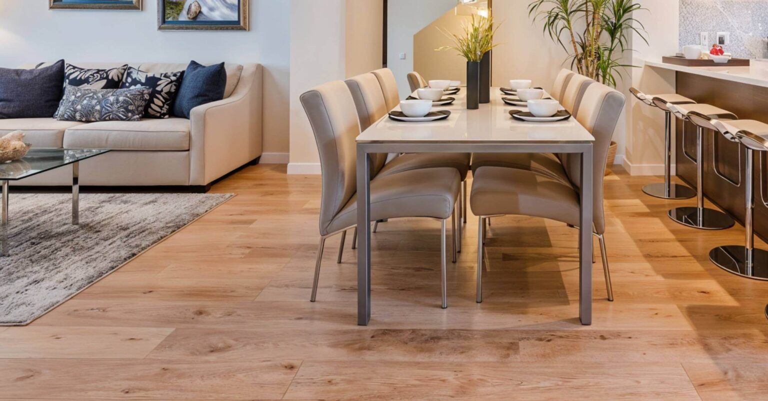 Brown wood floor in open dining room